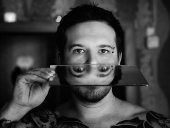 Portrait of young woman with eyes closed standing outdoors
