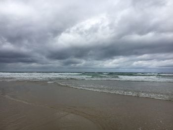 Scenic view of beach against sky