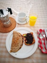 Close-up of breakfast served on table