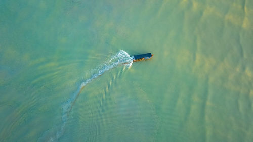 High angle view of boat moving on river