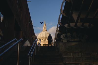 Low angle view of steps leading towards st paul cathedral against sky