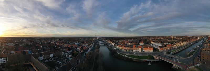 High angle view of buildings against sky during sunset