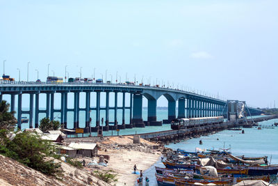 Bridge over river against clear sky