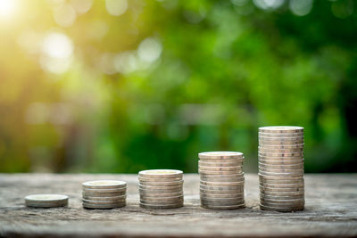 Stack of coins on table