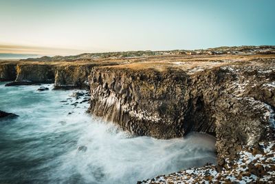 Scenic view of sea against clear sky