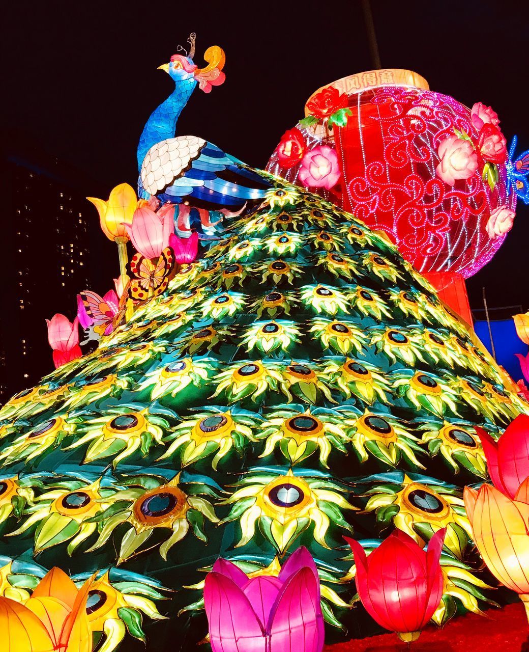 LOW ANGLE VIEW OF ILLUMINATED DECORATION