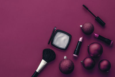 High angle view of beauty products on yellow background