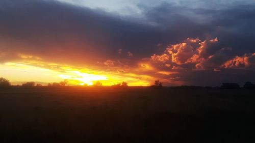 Scenic view of dramatic sky during sunset