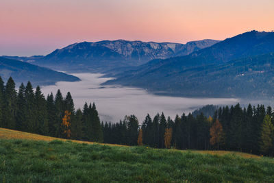 Scenic view of mountains against sky during sunset