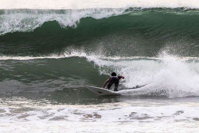 Man surfing in sea