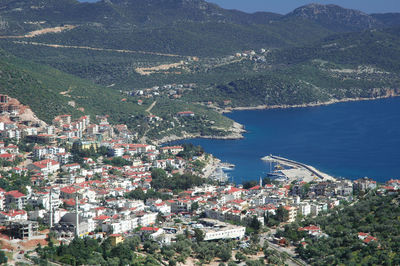 High angle view of townscape by sea