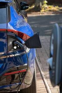 Close-up of car on street