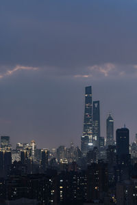 Buildings in city against sky