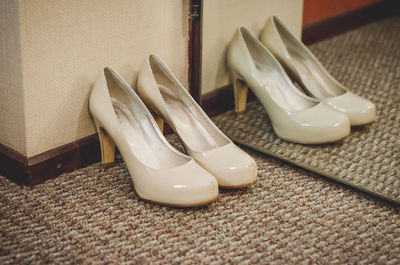 Close-up of shoes on table