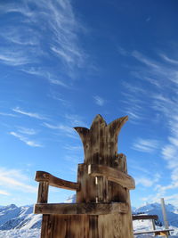 Low angle view of wooden structure against sky