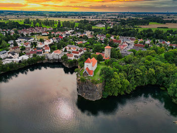 High angle view of townscape by lake