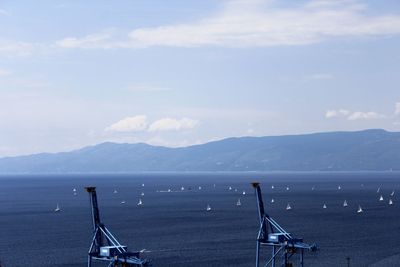 Scenic view of sea against blue sky