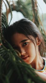 Close-up portrait of a smiling young woman