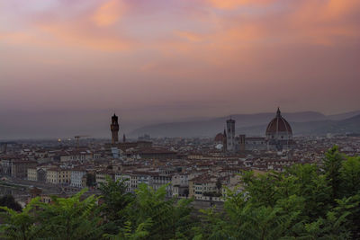 High angle view of townscape florence against sky during sunset