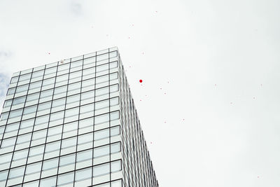 Low angle view of skyscraper against sky