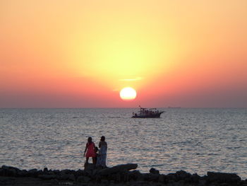 Scenic view of sea at sunset