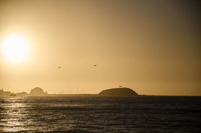 View of sea against sky during sunset