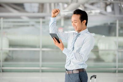 Young man using mobile phone