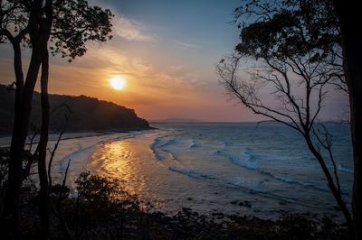 Scenic view of sea against sky during sunset