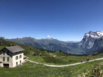 Scenic view of landscape against clear blue sky