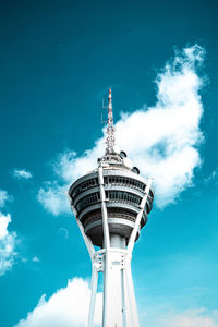 Low angle view of menara alor setar against cloudy sky