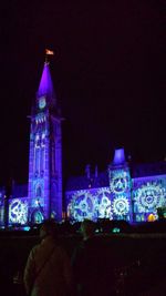 Illuminated tower at night