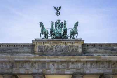 Low angle view sculpture on brandenburg gate