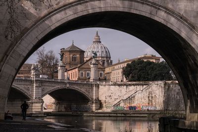 Saint peter basilica seen from arch bridge in city