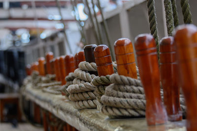 Close-up of ropes on wood