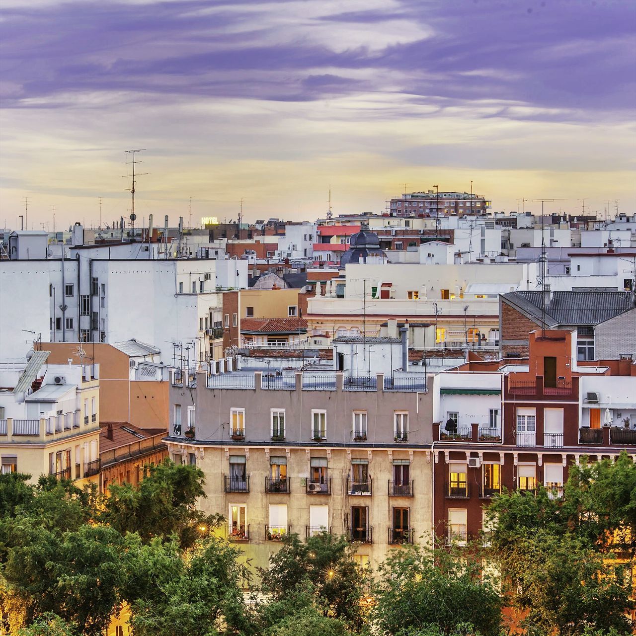 architecture, building exterior, built structure, sky, residential structure, residential building, sunset, house, city, cloud - sky, water, residential district, tree, cloud, town, outdoors, high angle view, no people, river, building