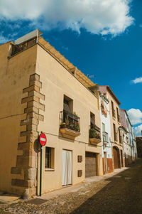 Low angle view of buildings against sky