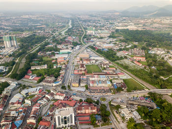 Aerial view of cityscape against sky