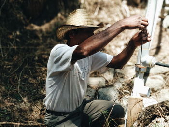 Man working on field