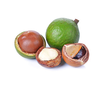 Close-up of fruits against white background