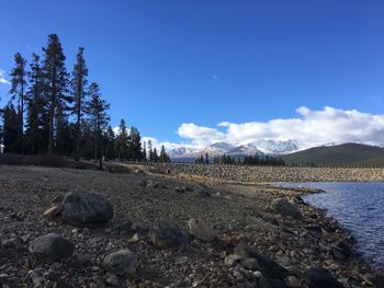 Scenic view of landscape against blue sky