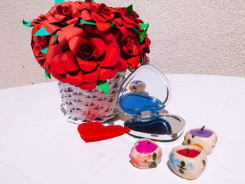 High angle view of multi colored flower vase on table