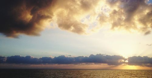 Scenic view of sea at sunset