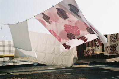 Clothes drying against the sky