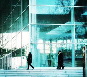 People walking in modern building