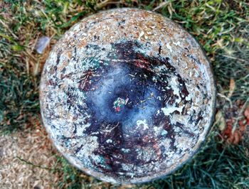 Close-up of crystal ball on field