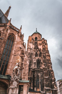 Low angle view of historic building against sky