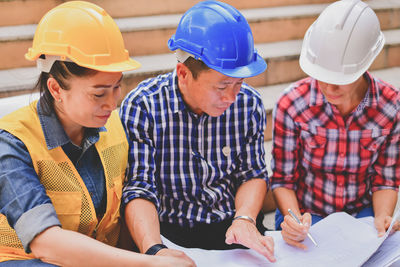 Low angle view of men working