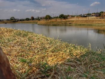 Scenic view of river against sky