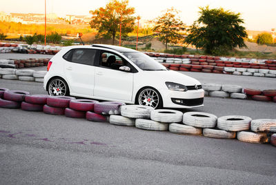 Side view of cars in parking lot