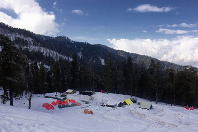 Scenic view of snowcapped mountains against sky